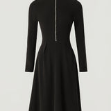 Woman wearing a zip-front long-sleeve stretch dress