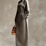 Woman wearing a high-neck maxi dress