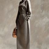 Woman wearing a high-neck maxi dress