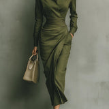 Woman wearing a wrap-style midi dress