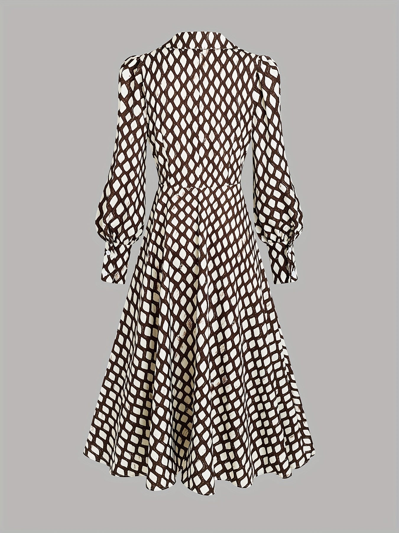 Woman wearing a rhombus print dress with belted waist