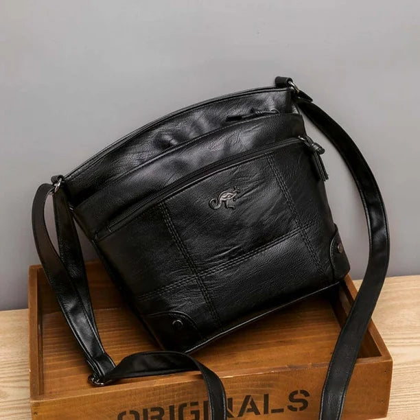 Tassel-Pull Handbag by Eleanor Vale