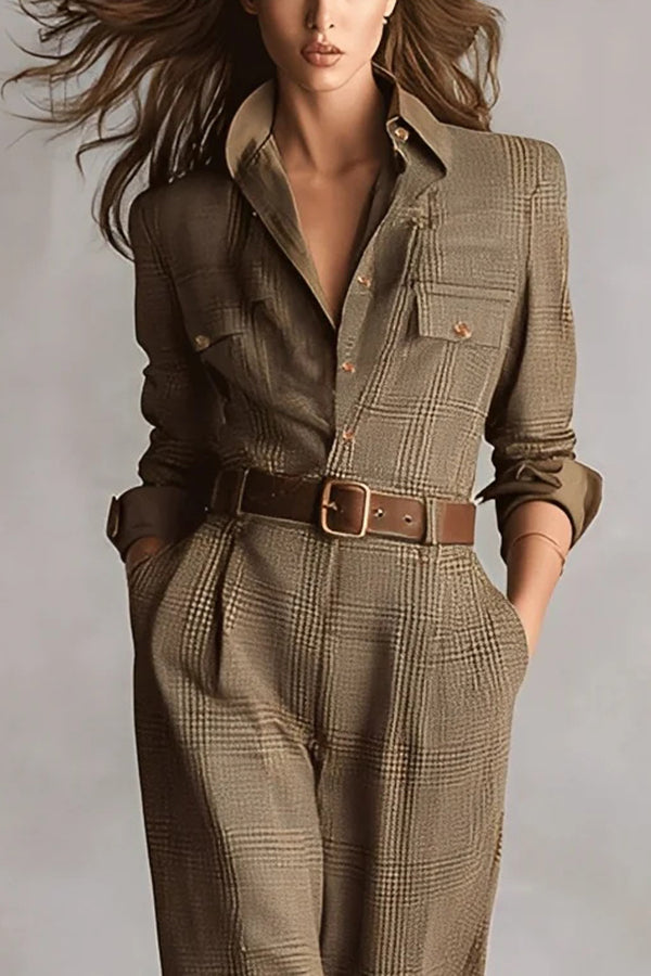 Woman wearing a tailored check jumpsuit with belt