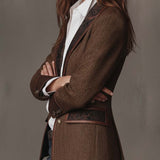Woman wearing a herringbone panel blazer