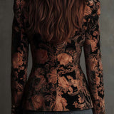 Woman wearing a black and bronze floral blazer