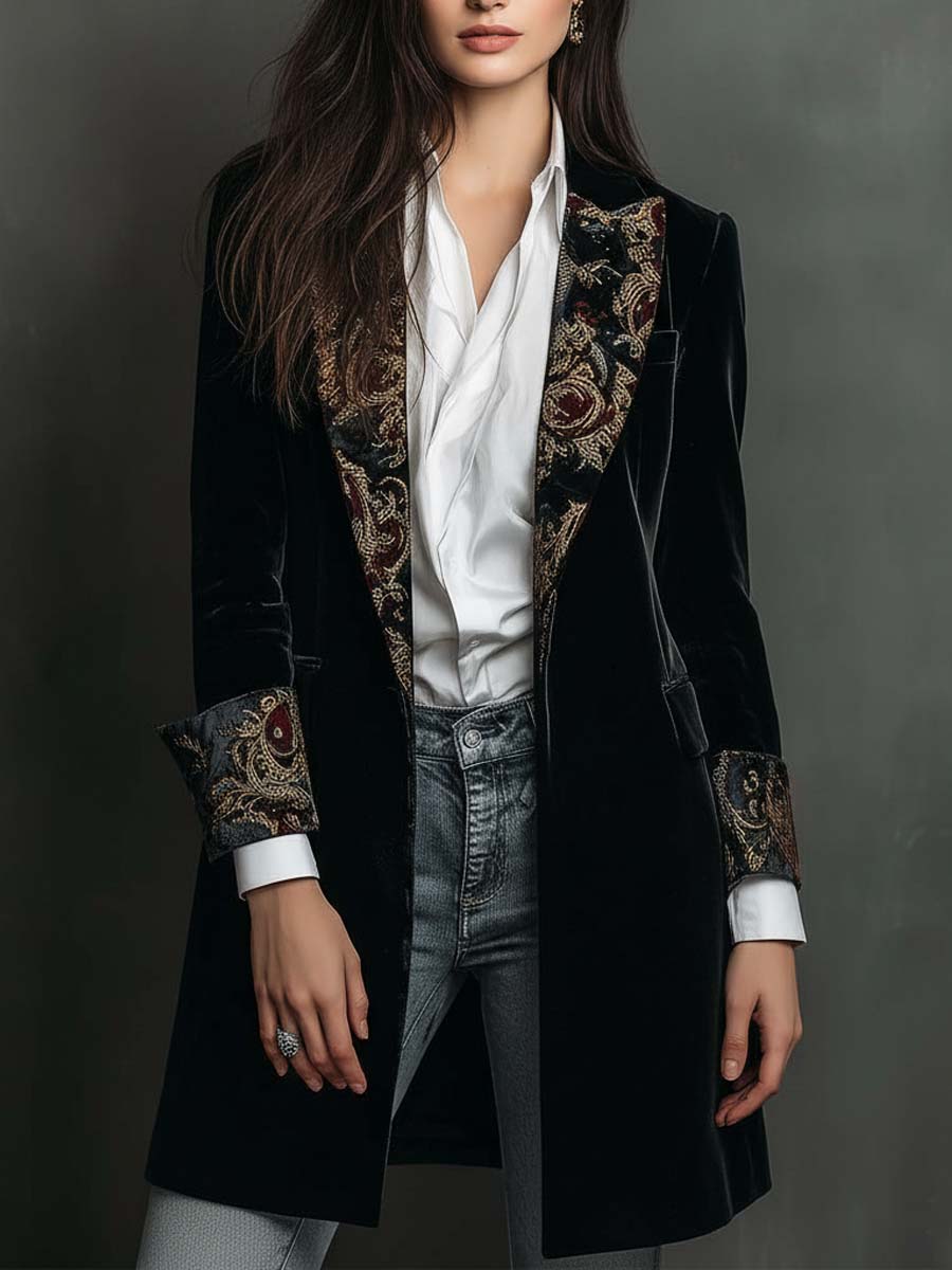 Woman wearing a long slim baroque print blazer