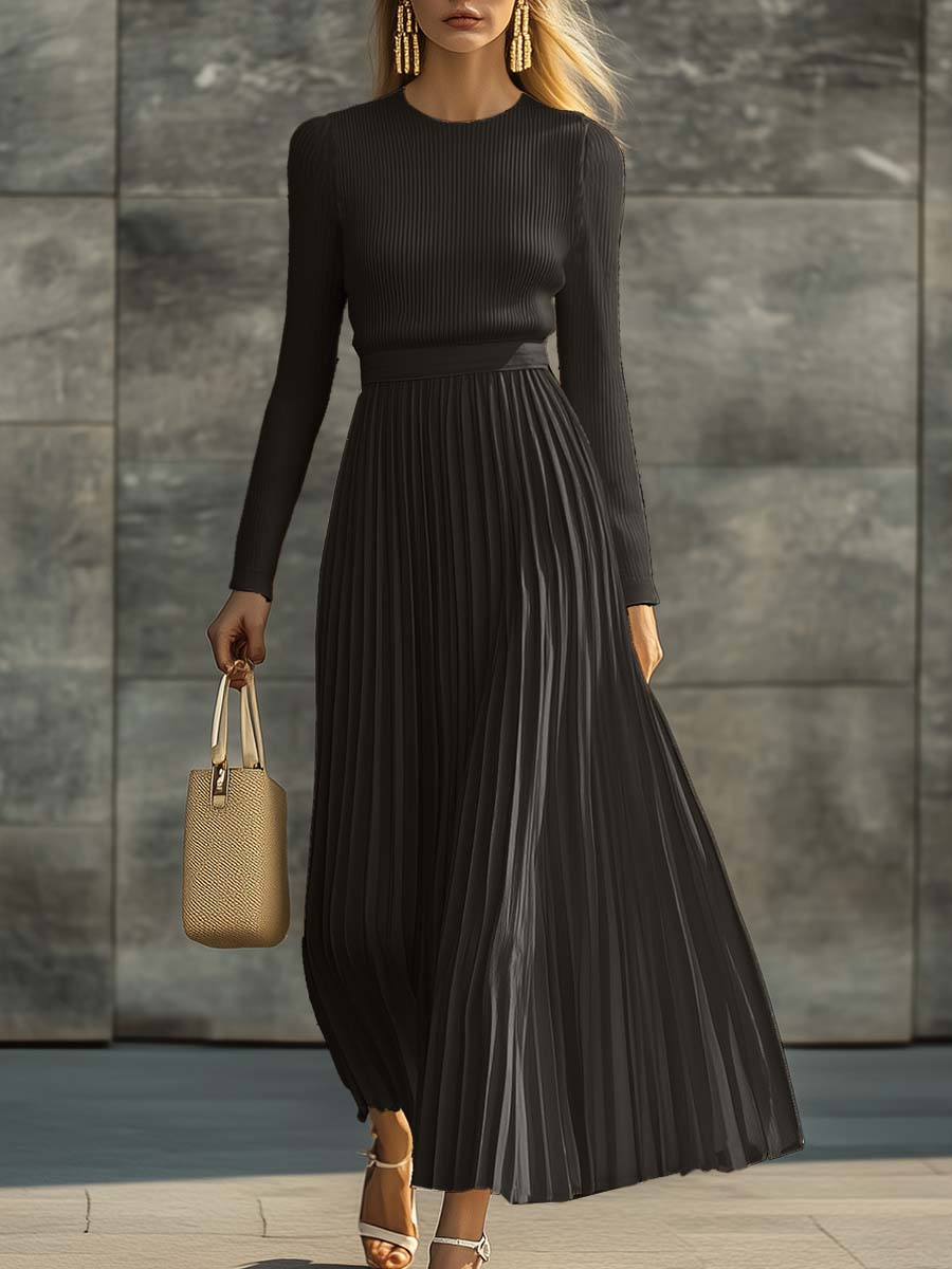Woman wearing a knitted satin dress with pleated skirt