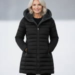 Woman wearing a fleece-lined quilted padded jacket with a shaped waist
