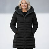 Woman wearing a fleece-lined quilted padded jacket with a shaped waist