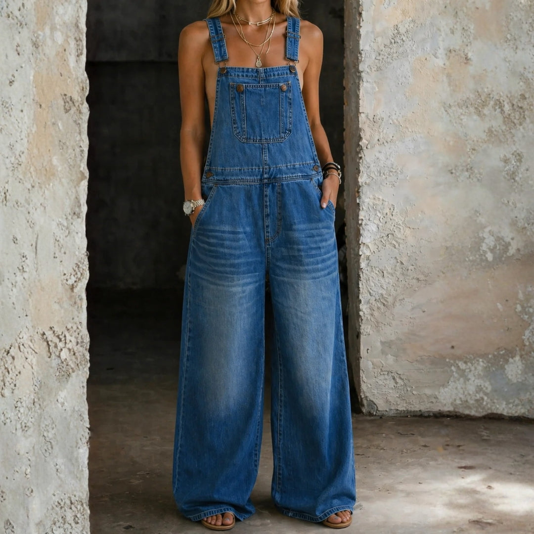 Woman wearing an elastic-waist denim all-in-one with a Peter Pan collar