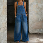 Woman wearing an elastic-waist denim all-in-one with a Peter Pan collar