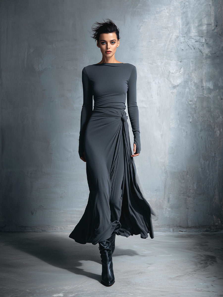 Woman wearing a long-sleeve maxi dress with an adjustable side tie