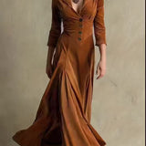 Woman wearing a button-front collar dress with 7/8 sleeves