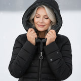 Woman wearing a fleece-lined quilted padded jacket with a shaped waist