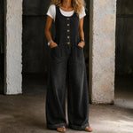 Woman wearing washed cotton dungarees with side pockets
