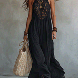 Woman in a draped sleeveless ankle-length maxi dress
