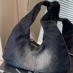 Woman carrying a casual shoulder bag