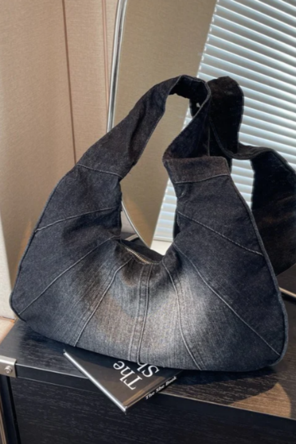 Woman carrying a casual shoulder bag
