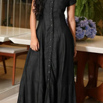 Woman wearing a long shirt-style denim dress