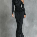 Woman wearing a satin ruched mermaid dress
