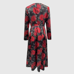 Woman wearing a floral print A-line maxi dress