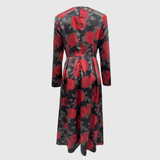 Woman wearing a floral print A-line maxi dress