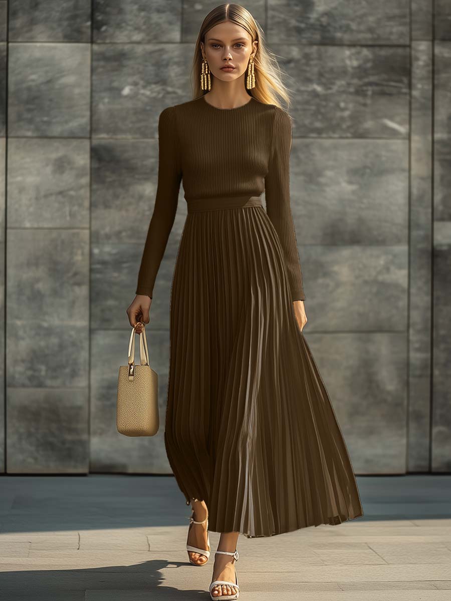 Woman wearing a knitted satin dress with pleated skirt
