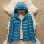 Ocean blue lightweight padded jacket with a feminine fit