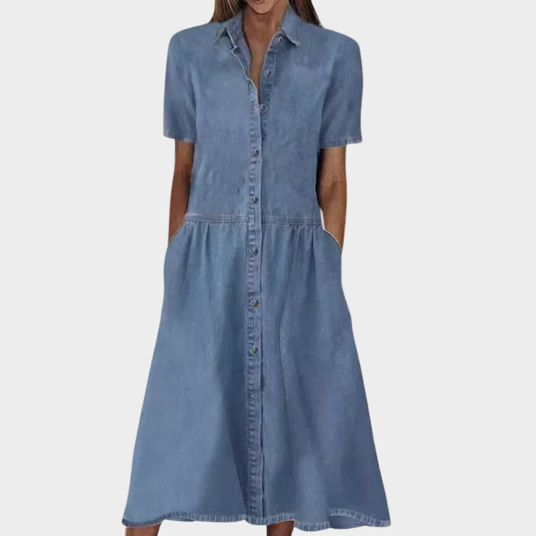 Woman wearing a button-through calf-length denim dress