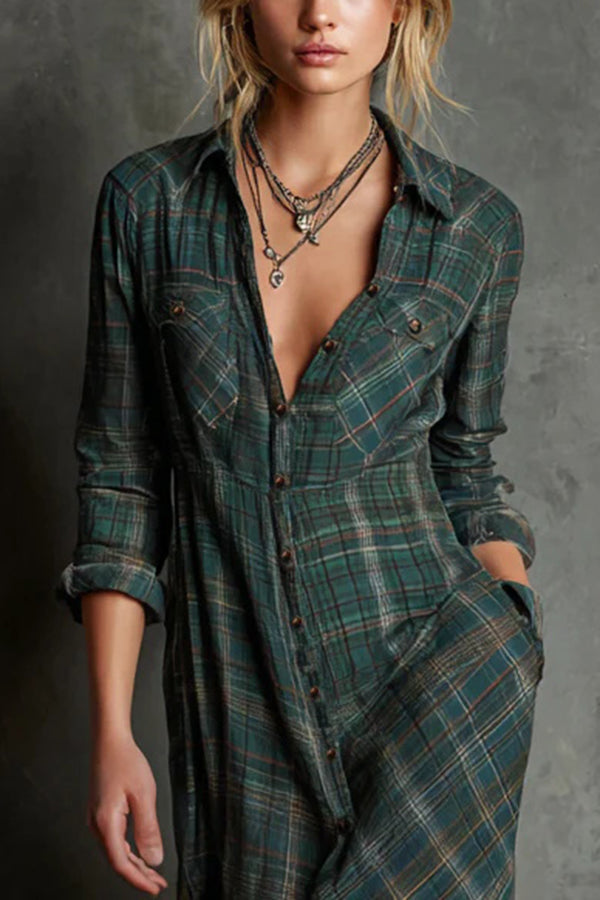 Woman wearing a full-length green plaid shirt dress with long sleeves