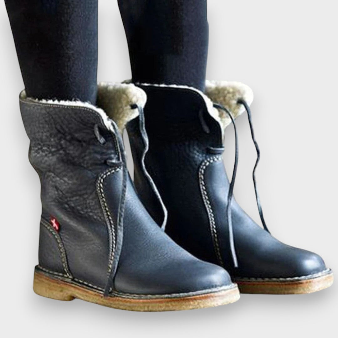 Marjorie shearling-lined leather boots in Dark Blue, front view on model