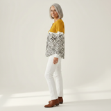 Liv Luxuriously Soft Patterned Jumper - side view showing relaxed fit and ribbed cuffs