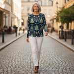 Fanny Patterned Jumper worn outdoors in navy Christmas tree print