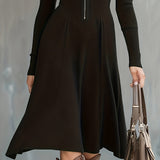 Woman wearing a zip-front long-sleeve stretch dress