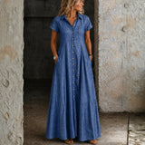 Woman wearing a long shirt-style denim dress