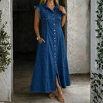 Woman wearing a plus-size sleeveless denim shirt dress