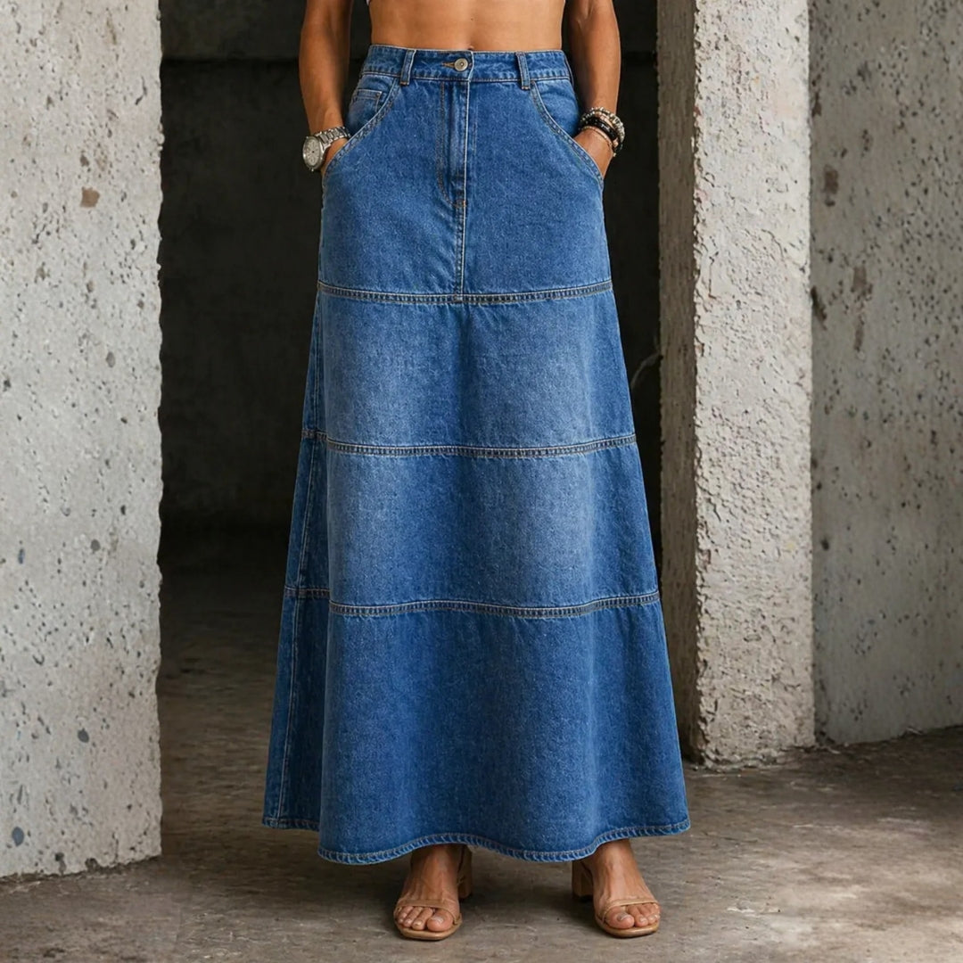Woman wearing a mermaid-cut midi denim skirt