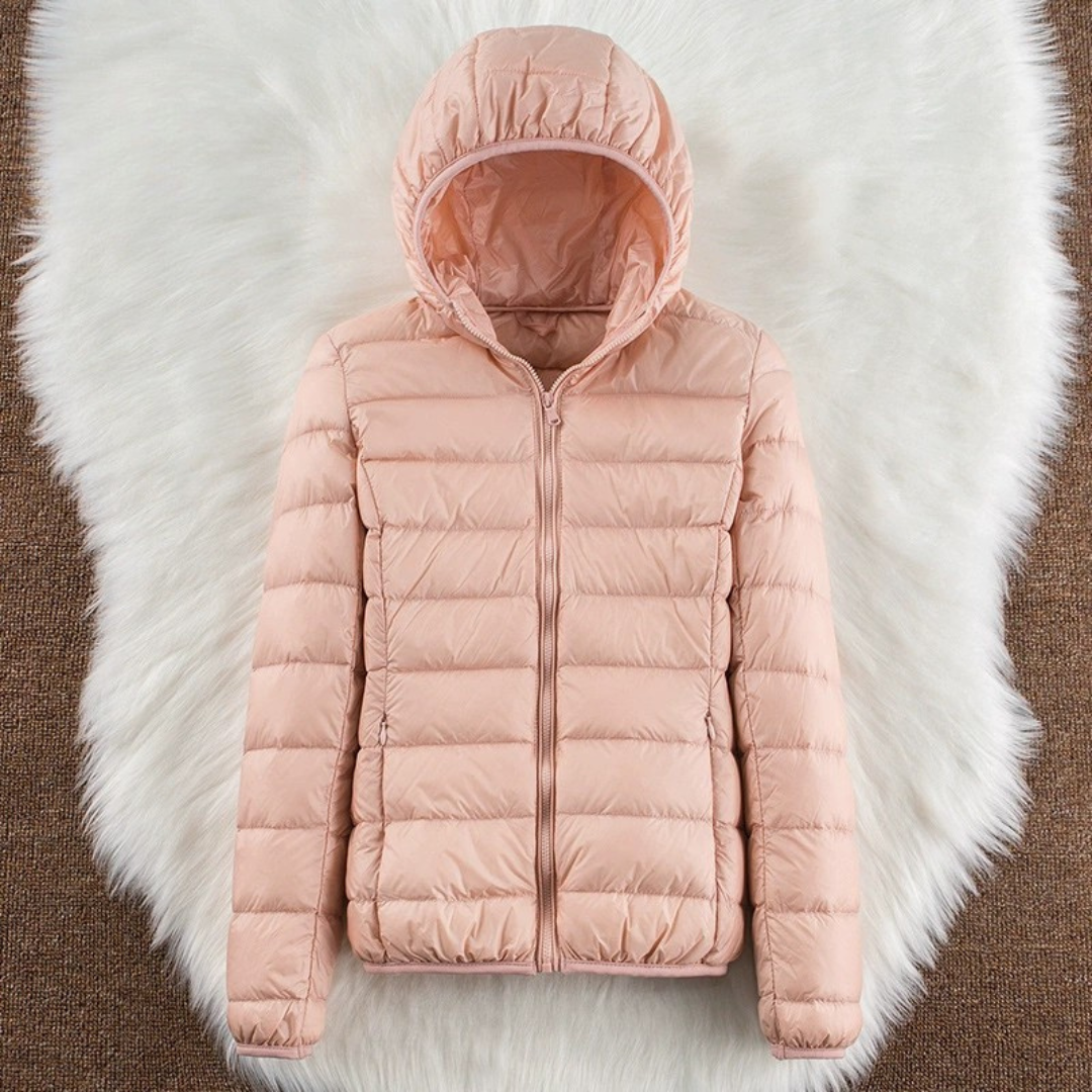 Light pink lightweight padded jacket with a feminine fit