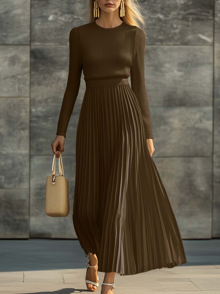 Woman wearing a knitted satin dress with pleated skirt