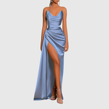 Woman wearing a satin maxi dress with thigh-high slit
