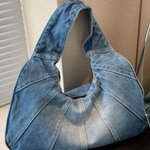 Woman carrying a casual shoulder bag