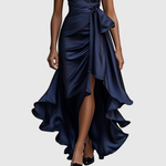 Woman wearing an evening wrap maxi dress with high slit