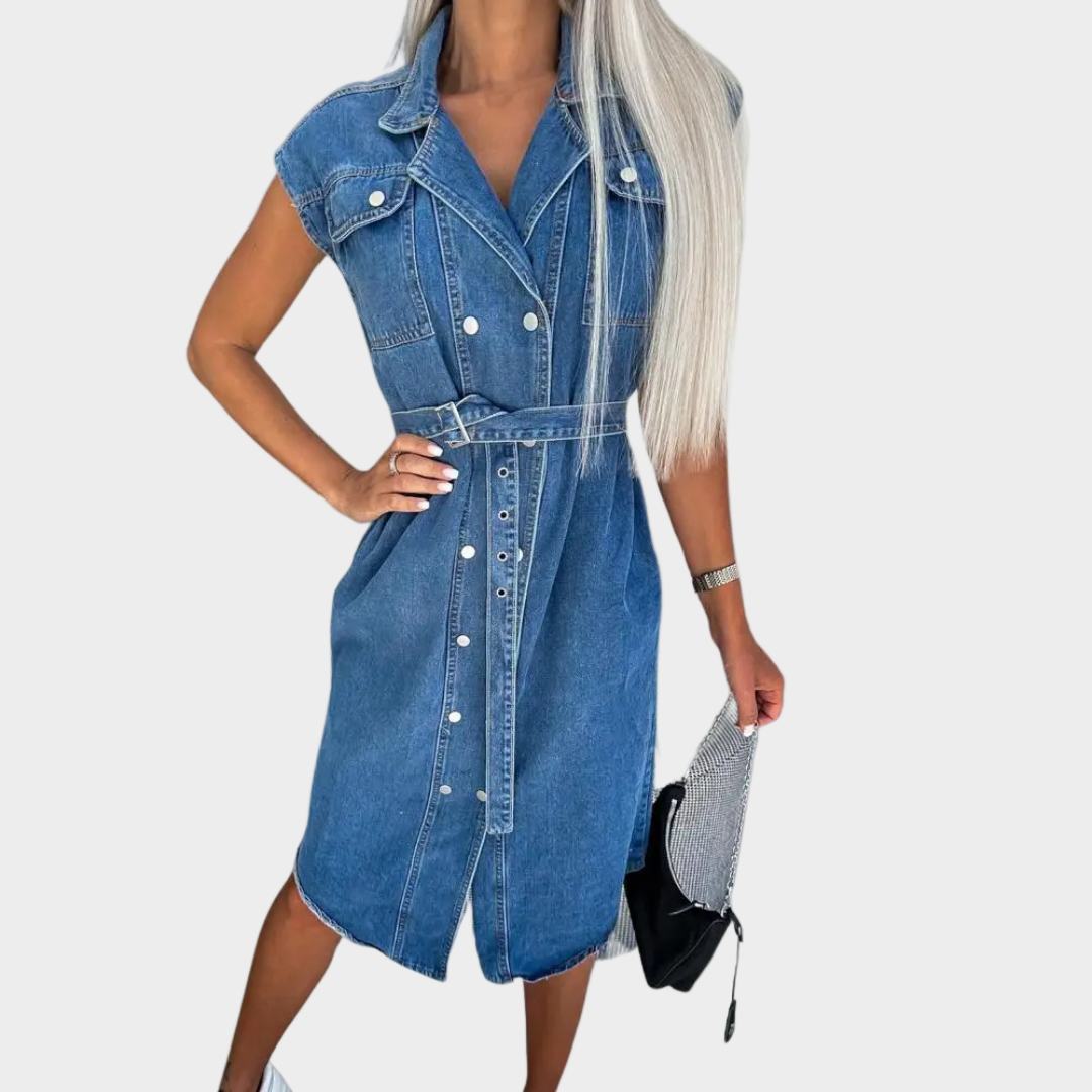 Woman wearing a sleeveless denim dress with a matching belt