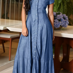 Woman wearing a long shirt-style denim dress