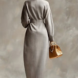 Woman wearing a high-neck maxi dress