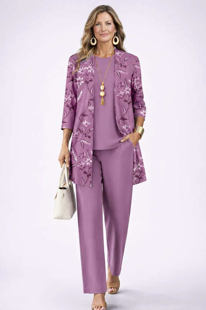 Woman wearing a patterned three-piece cardigan set with wide-leg trousers