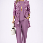 Woman wearing a purple three-piece cardigan set with wide-leg trousers