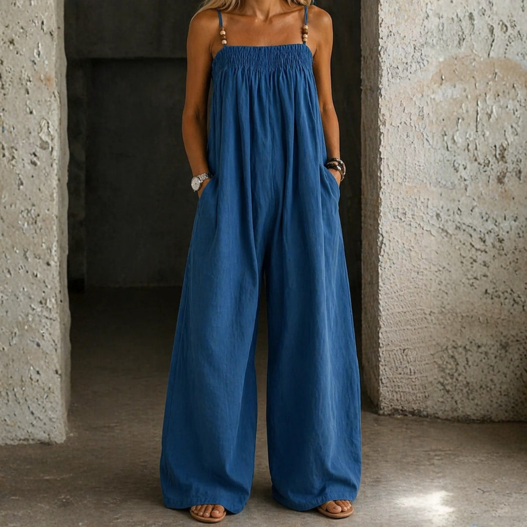 Woman wearing a wide-leg denim jumpsuit