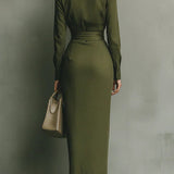 Woman wearing a wrap-style midi dress