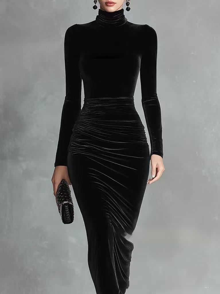 Woman wearing a black velvet fitted dress